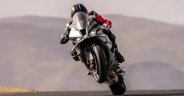 BMW S 1000 RR superbike leaned aggressively in a race-style riding scene.